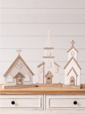 Whitewashed Wooden Church Figures with natural trim and cross-topped steeples, available in three sizes.