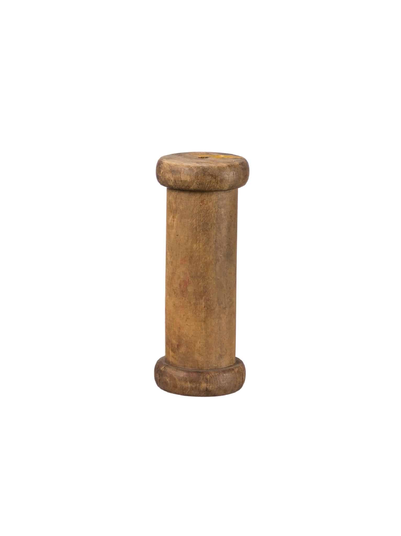 Medium vintage wooden spool made from salvaged wood with a naturally worn finish.