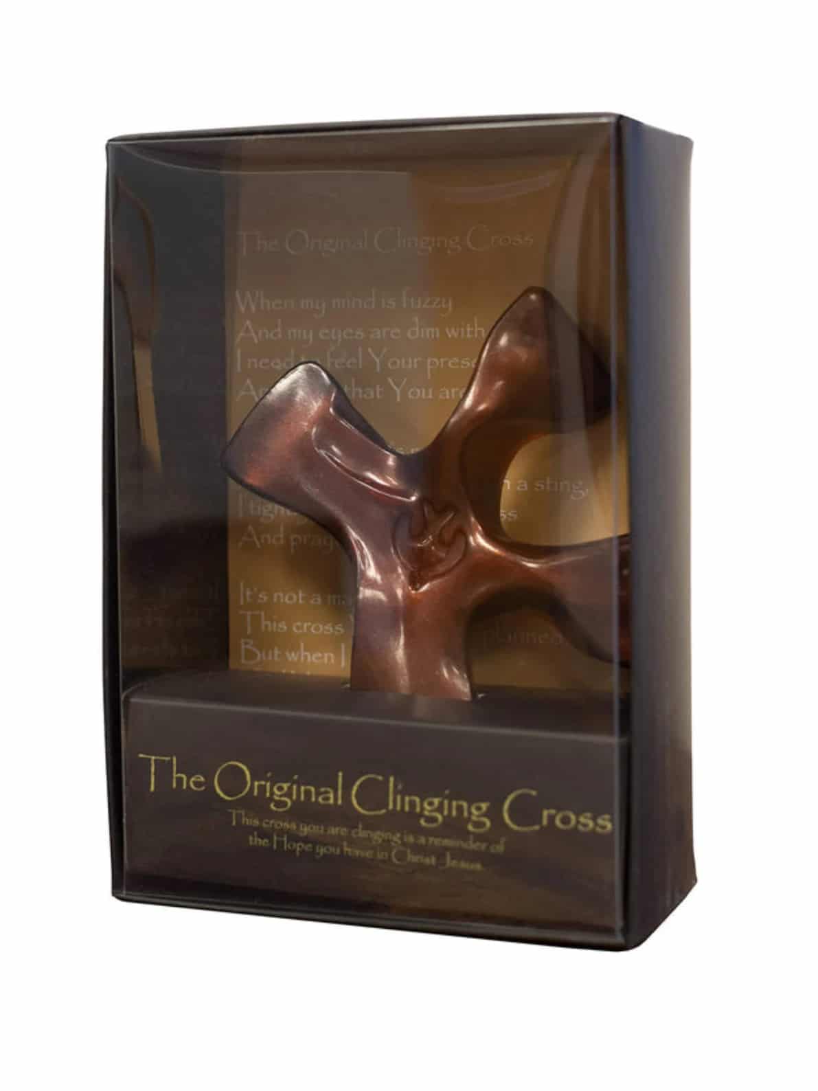 Dark tortoise copper Clinging Cross shown in gift box with prayer card