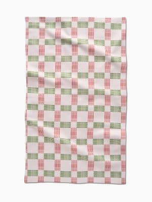 Holiday kitchen towel with red and green plaid pattern by Geometry.
