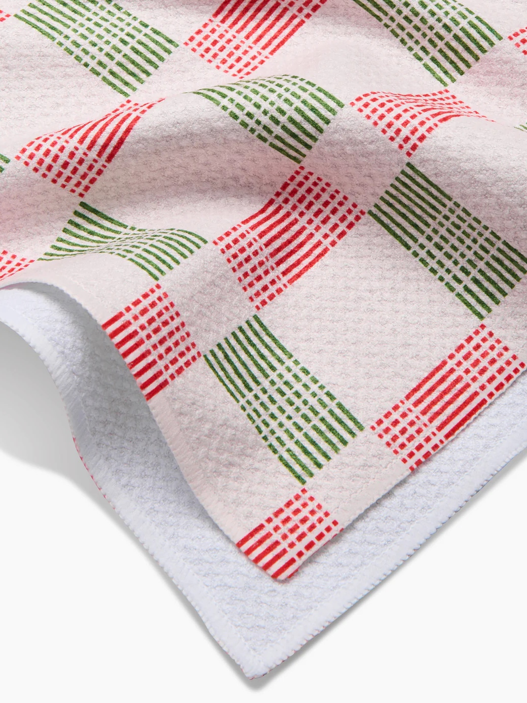 Christmas plaid Geometry towel featuring red and green check design.