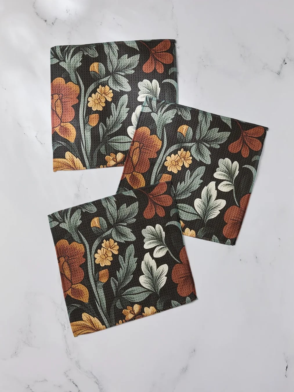 be-made-hays-ks-geometry-dishcloth-set-classic-floral Geometry 3-pack dishcloths in vintage floral design with rust, tan, and cream flowers on black.