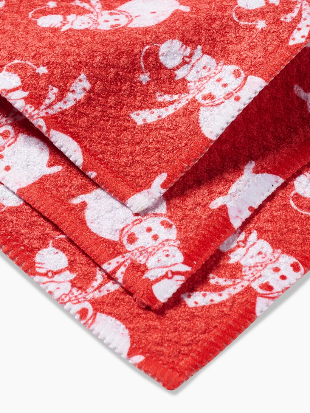 Set of three red Geometry dishcloths with smiling snowmen design, eco-friendly and absorbent.