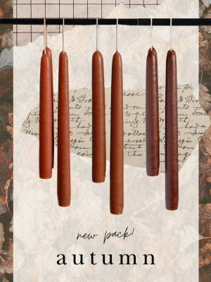 Set of three autumn-inspired taper candles in earthy tones of Clay, Camel, and Umber, displayed together.
