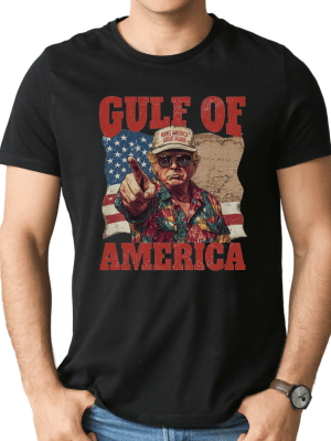 Black cotton t-shirt featuring a vintage-style “Gulf of America” graphic with a patriotic character, American flag, and retro map design on the front.