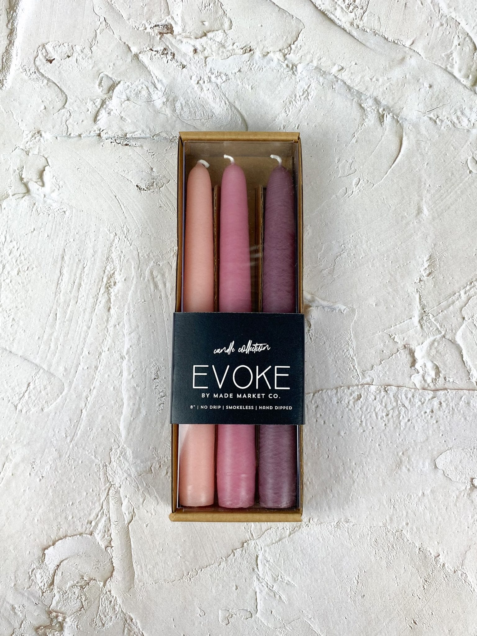 Luxe taper candle trio boxed in soft romantic tones of mauve, blush, and plum.