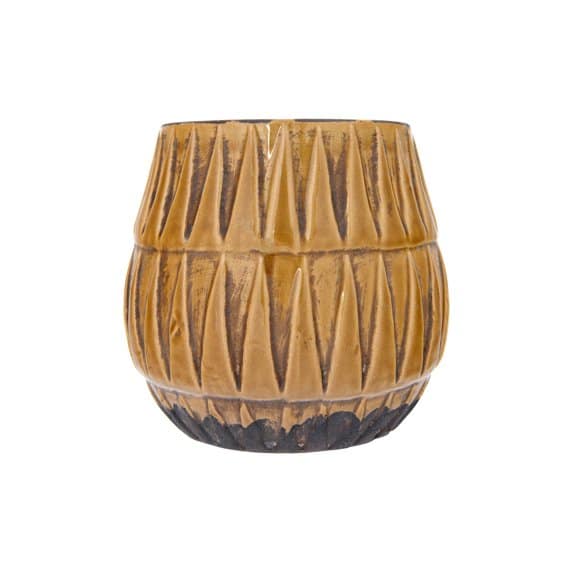 Embossed terracotta planter in golden mustard glaze with geometric carving and dark base