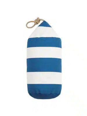 Striped navy and white buoy-shaped pillow with a rope loop, styled on a window hook with other coastal pillows.