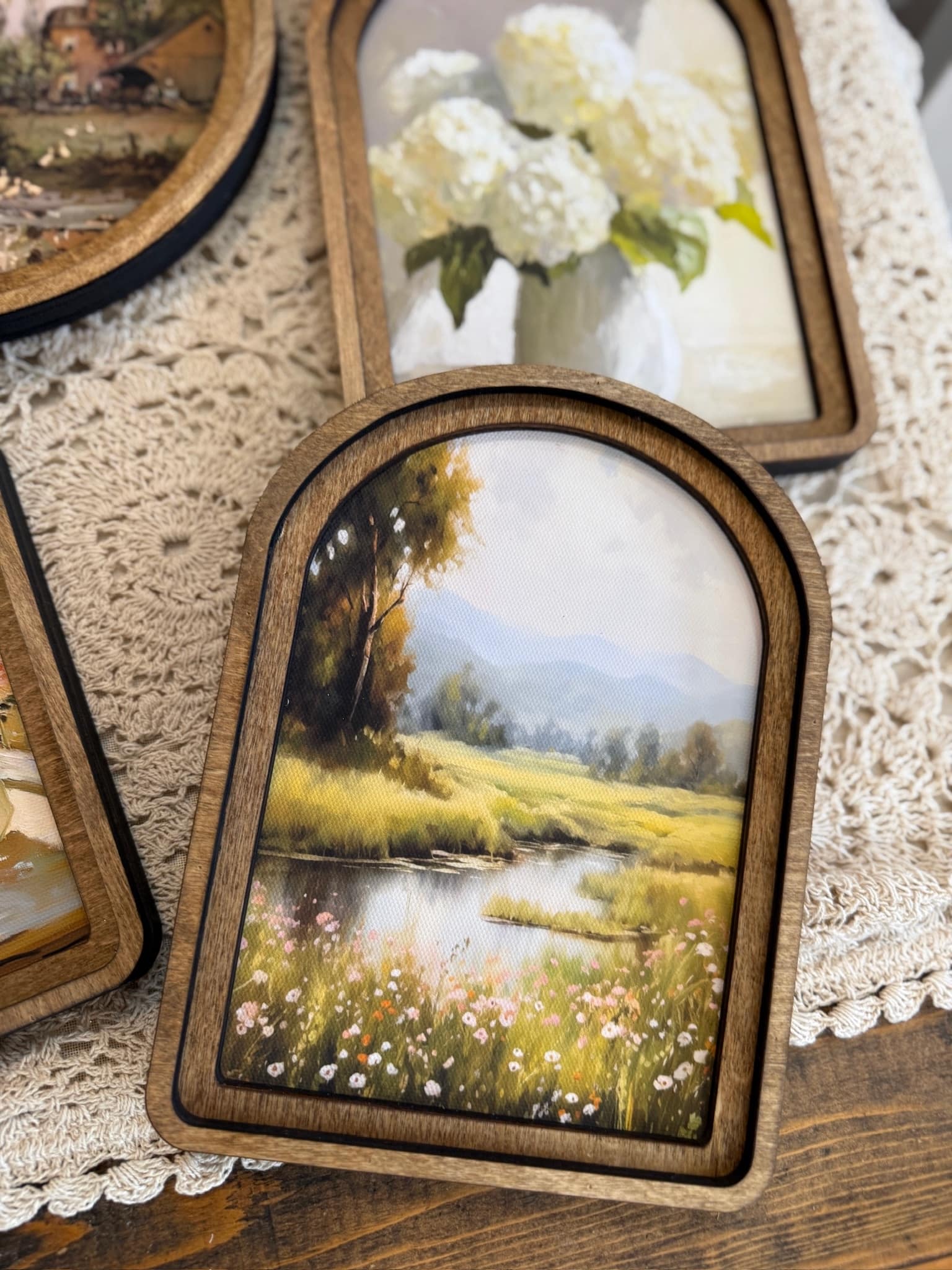Spring Stream Arched Wall Art with peaceful countryside landscape in wood arched frame.