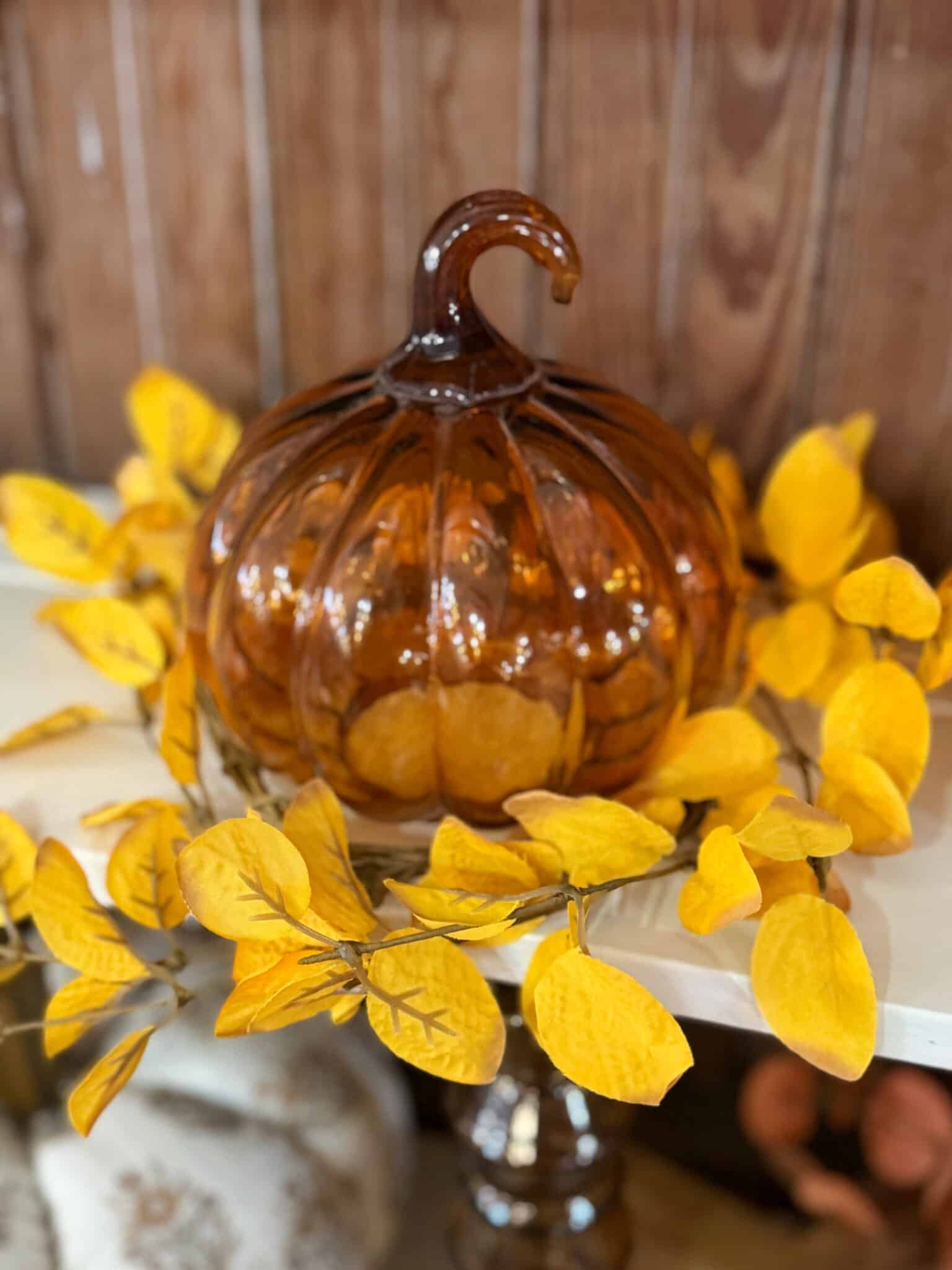 Light Yellow Eucalyptus Candle Ring with Orange Glass Pumpkin Cloche